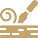 Woodworking chisel creating wood shavings