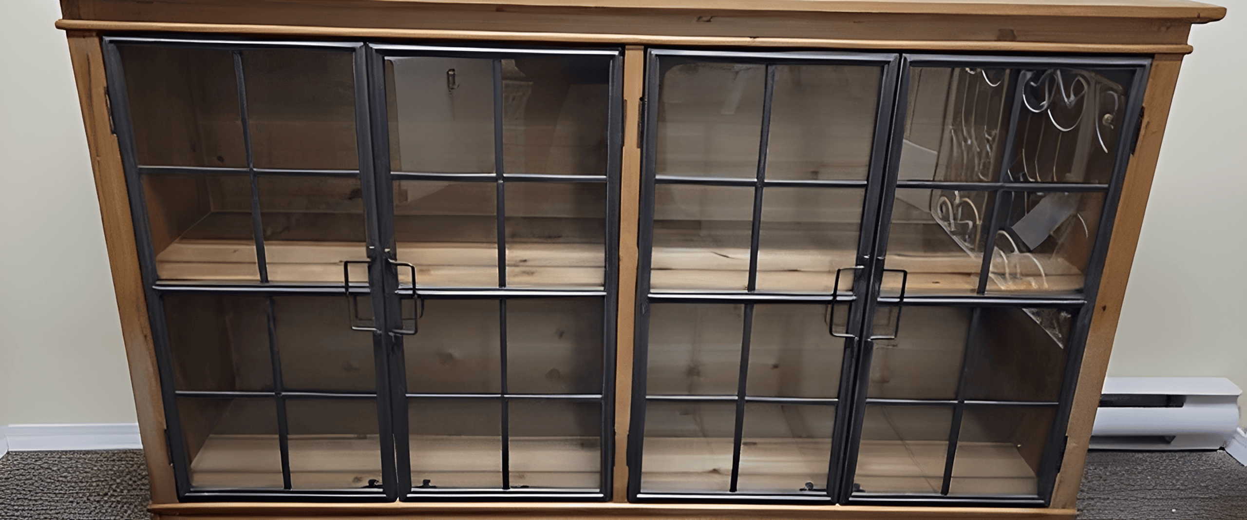 Wooden display cabinet with four glass doors